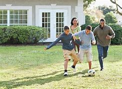 Image result for Stock-Photo Family Playing in Yard
