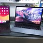 Image result for MacBook 1/4 Inch Compared to iPad Pro