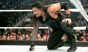 Image result for WWE Roman Reigns Spear