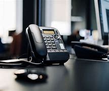 Image result for A Phone On a Desk Office