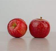 Image result for Two Red Apple On a Table