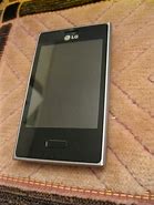 Image result for LG Muziq Phone Silver