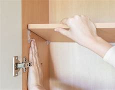 Image result for Remove Cabinet Shelf Clips