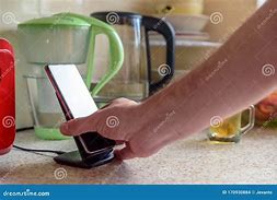 Image result for Person Placing Phone On Table