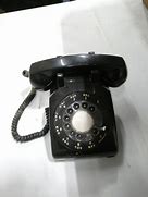 Image result for ITT Black Rotary Dial Telephone