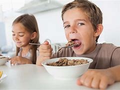 Image result for Images of People Eating Breakfast