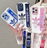 Image result for Iphone14 Plus Adidas Strap Case