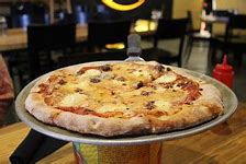 Image result for Leaning Tower Pizza