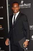 Image result for Drogba in Suit