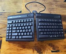 Image result for Laptop Stand and Wireless Keyboard