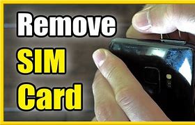 Image result for +How to Remove Sim Card Tra 10 XS
