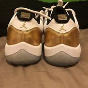 Image result for Jordan 11 Gold and White High Top