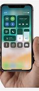 Image result for iPhone X in Kid Hand