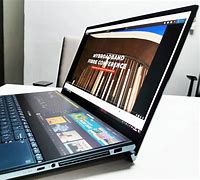 Image result for Person Holding a Box of Asus Laptop Screen