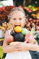 Image result for People Holding Fruit