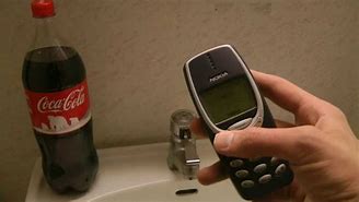 Image result for Nokia 3310 Coke Phone White
