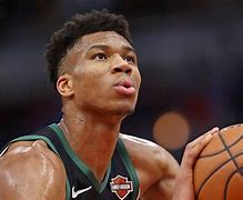 Image result for Giannis Antetokounmpo Peace Sign