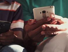 Image result for Hand Holding a Cell Phone