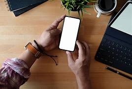 Image result for Mobile Phone On Desk