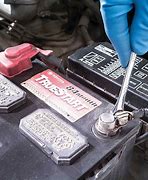 Image result for Car Battery Replacement at Home