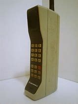 Image result for Older Phone with Camera Attachment