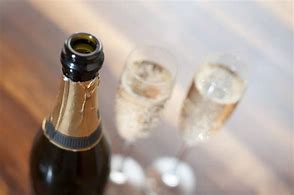 Image result for Open Champagne Bottle with Knife
