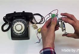 Image result for Ring Dial Phone