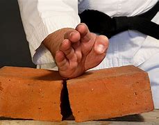 Image result for Karate Breaking a Brick Stone