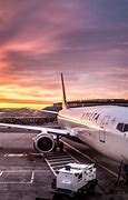 Image result for Drlta Plane Sunset