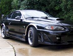 Image result for wrecked 1998 black mustang