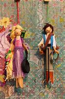 Image result for Flynn Rider and Rapunzel Dolls