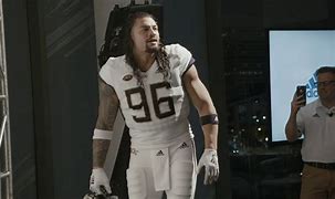 Image result for Roman Reigns Football Team