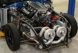 Image result for Race Car with Engine On the Front