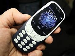 Image result for Nokia 3310 in Hand