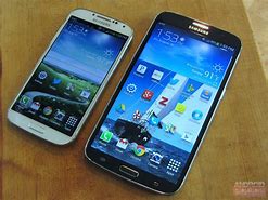 Image result for Galaxy Mega vs iPhone 6 Plus