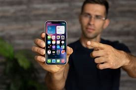 Image result for A Hand Charging an iPhone