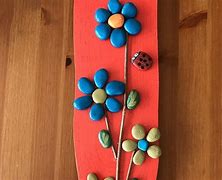 Image result for Pebble Painting Flowers