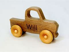 Image result for Moving Wooden Toys On Wheels