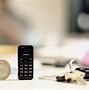 Image result for Mini Real Phones Toys