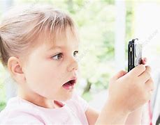 Image result for Toddler with Cell Phone