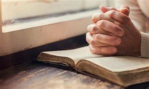 Image result for Believer Praying with Bible
