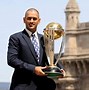 Image result for MS Dhoni with Trophies