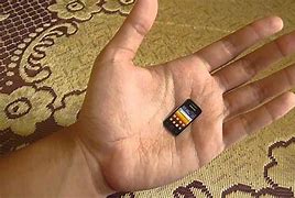 Image result for Tiniest Phone in the World