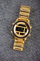 Image result for Nixon Gold Digital Watch