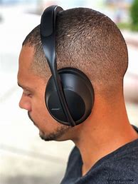 Image result for Person Wearing Noise Cancelling Headphones