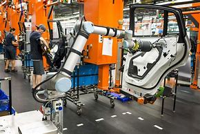 Image result for Robot Auto Mobile Assembly Line