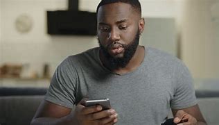 Image result for Black Man with Mobile Phone