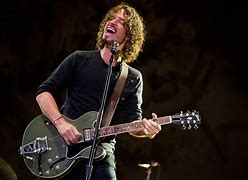 Image result for Chris Cornell Playing Guitar