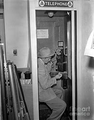 Image result for Man in Phone Booth