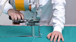 Image result for Commercial Fabric Cutting Machine